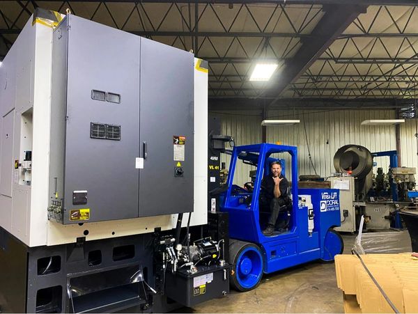 Heavy machinery rigging and relocation